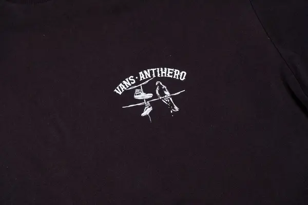 stock image kent, uk 01.01.2023 Vans x Anti Hero Skateboards Shirt On The Wire Adult unisex street fashion and street. skateboarding style clothing brand like supreme.