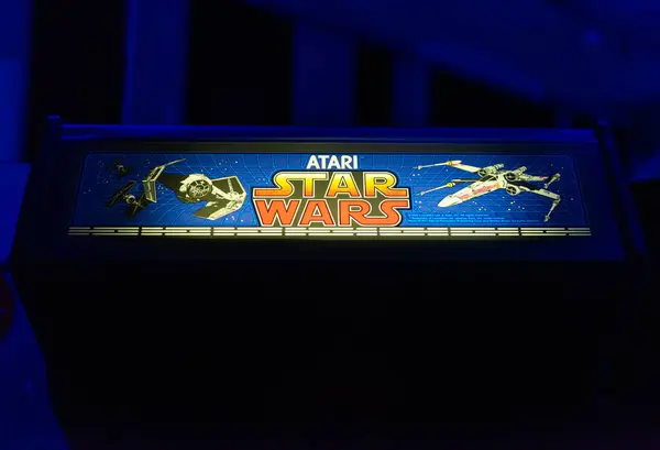 stock image Blackpool, uk, 01.01.2023 A vintage retro Star Wars Atari arcade game signage on an old arcade game cabinet at a retro vintage arcade computer fair. Norbreck hotel conference room.