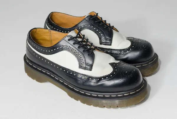 Stock image london, england, 05/05/2019 Dr Martens 3989 bex smooth leather brogue shoes  fashionable punk historic british made leather boots. dr martens air war with bonding soles. built to last. 