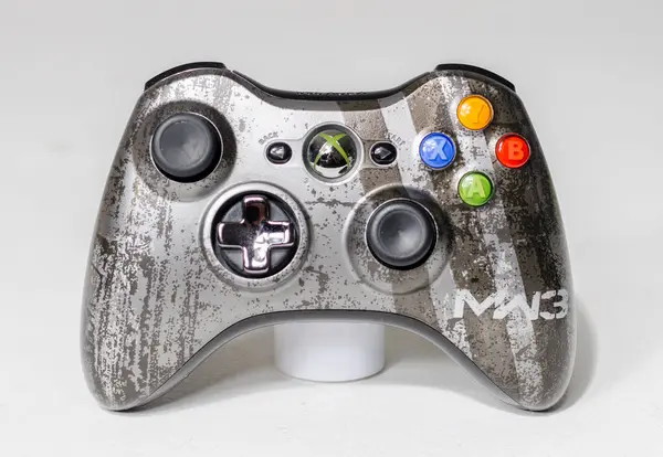 Stock image london, uk 05/05/2020 An microsoft  xbox 360 call of duty modern warfare 3 limited edition controller on a white studio backdrop. collectable rare home arcade video gaming.