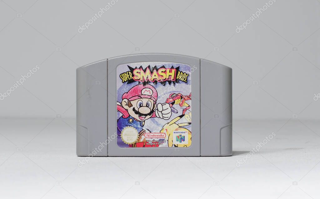 London, uk 05/05/2019 Nintendo n64 super smash bros 64 official original video game cartridge on a white isolated background. iconic retro vintage video gaming machine. Japanese technology 64 bit game