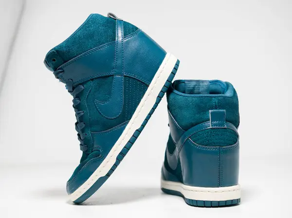 stock image kent, uk  01.01.2023  Nike Dunk Sky High Wedge Womens Trainers, teal green 2013 vintage Nike Air jordan basketball sneakers. nike air force one series . Fashionable retro  street fashion.