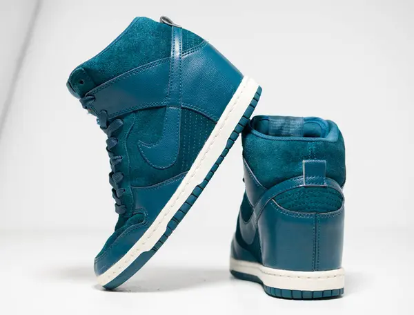 stock image kent, uk  01.01.2023  Nike Dunk Sky High Wedge Womens Trainers, teal green 2013 vintage Nike Air jordan basketball sneakers. nike air force one series . Fashionable retro  street fashion.