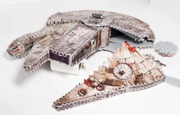 stock image kent, uk 01.01.2023 PUZZ 3D Star Wars Millenium Falcon Jigsaw Puzzle. official star wars vintage puzzle. space ship star wars merchandise. jigsaw 3d puzzle.