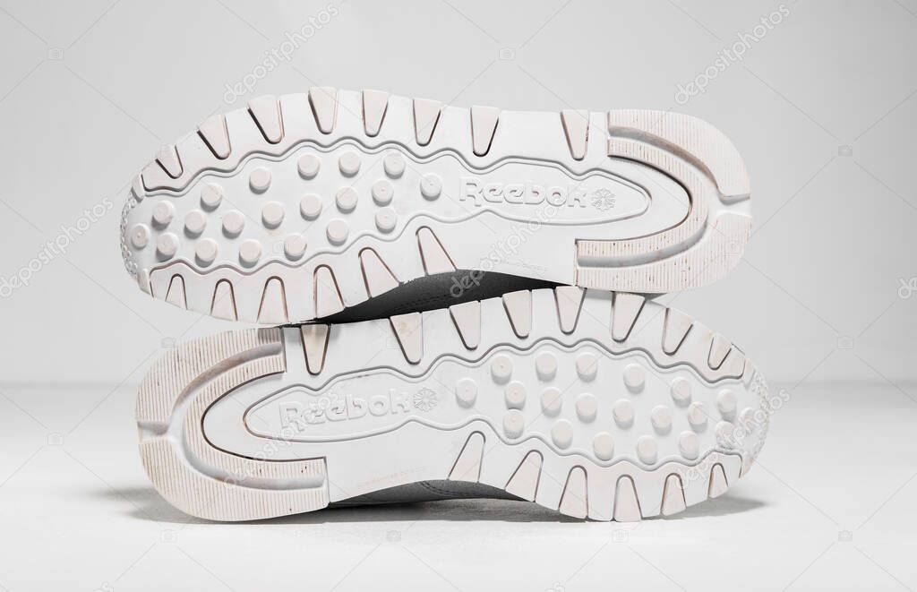 Kent,uk 05/05/2018 women Reebok Classic Trainers Metallic Silver Glitter Snow Grey And White unisex Stone Trainer  retro vintage british made shoes. shiny iridescent shoes.