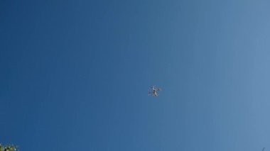 Drone,UAV start up, take off - close up of the engine. Propellers start to rotate fast. 4K Real Time