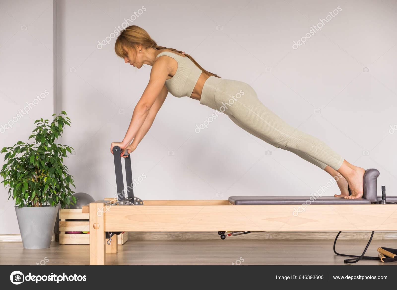 Woman Training Pilates Reformer Bed Reformer Pilates Studio