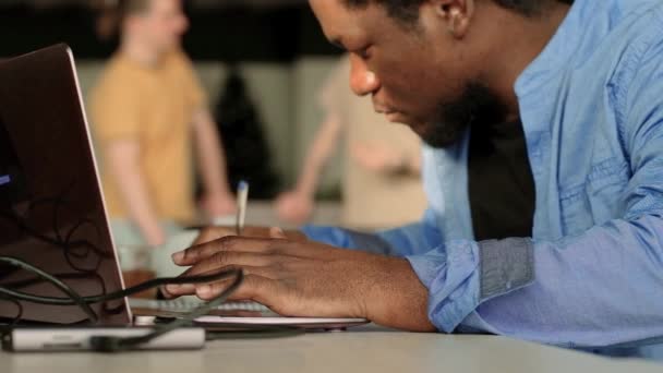 Black Man Writing Lines Code Desktop Two Monitors Laptop Aside — Vídeos de Stock