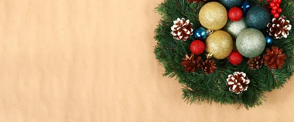 Christmas background. Festive wreath with Christmas balls, top view.