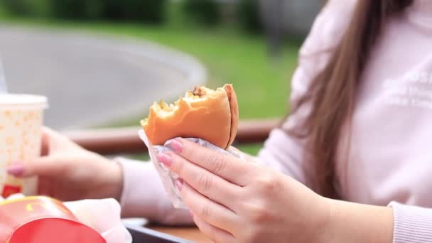 Kyiv Ukraine May 2023 Girl Eats Mcdonald Hamburger Woman Biting — Stock Video