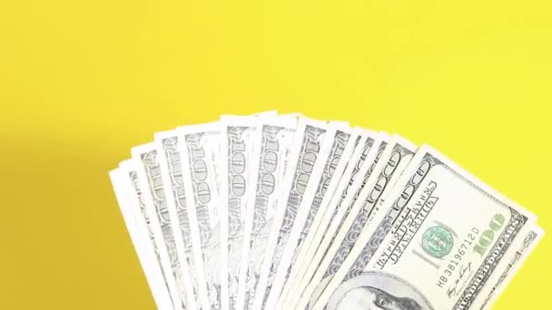 One Hundred Dollar Bills Yellow Background Winning Lottery Making Money — Stock Video
