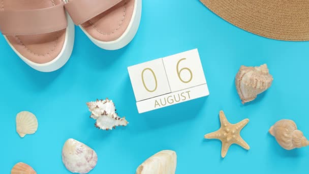 August Wooden Calendar Blue Background Summer Accessories Top View Vacation — Stock Video