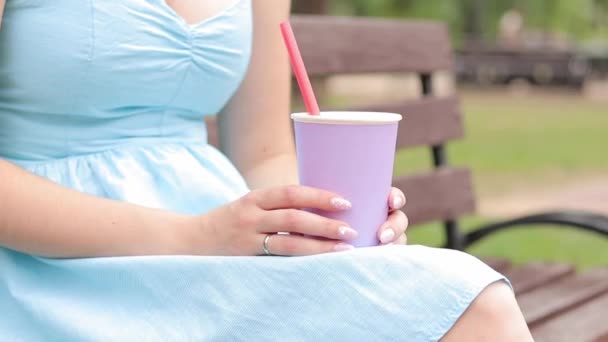 Girl Blue Dress Drinks Lemonade Park Cup Lavender Color Hands — Stock Video