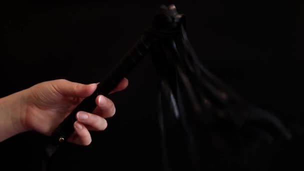 Woman Hand Holds Whip Dark Background Leather Whip Spanking Isolated — Stock Video