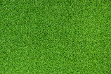 Yapay ot, kaplama. Yapay yeşil çimen paspası, üst manzara. Doku. Geçmişi. Suni çim, yapay liflerden yapılmış yüzey. Düz yeşil çimen dokusu. Kısa çimen