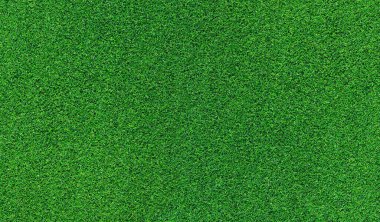 Yapay ot, kaplama. Yapay yeşil çimen paspası, üst manzara. Doku. Geçmişi. Suni çim, yapay liflerden yapılmış yüzey. Düz yeşil çimen dokusu. Kısa çimen