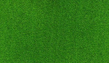 Yapay ot, kaplama. Yapay yeşil çimen paspası, üst manzara. Doku. Geçmişi. Suni çim, yapay liflerden yapılmış yüzey. Düz yeşil çimen dokusu. Kısa çimen