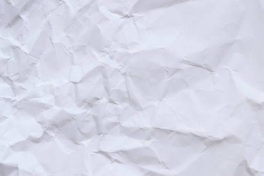 Buruşmuş beyaz kağıt arka plan. Buruşmuş beyaz kağıt dokusu ya da kağıt arkaplan. Kopyalama alanı olan ışık arkaplanı. Üst görünüm