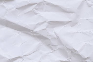 Buruşmuş beyaz kağıt arka plan. Buruşmuş beyaz kağıt dokusu ya da kağıt arkaplan. Kopyalama alanı olan ışık arkaplanı. Üst görünüm