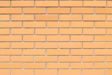 Tuğla duvar dokusu, arka plan. Dış tasarım için turuncu duvar arka planı. İnşaat konsepti, açık bina, garaj ya da ev. Klasik dama tahtası desenli ve görünür eklemli duvar