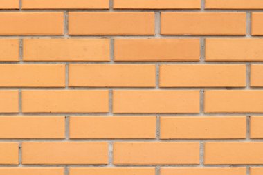 Tuğla duvar dokusu, arka plan. Dış tasarım için turuncu duvar arka planı. İnşaat konsepti, açık bina, garaj ya da ev. Klasik dama tahtası desenli ve görünür eklemli duvar
