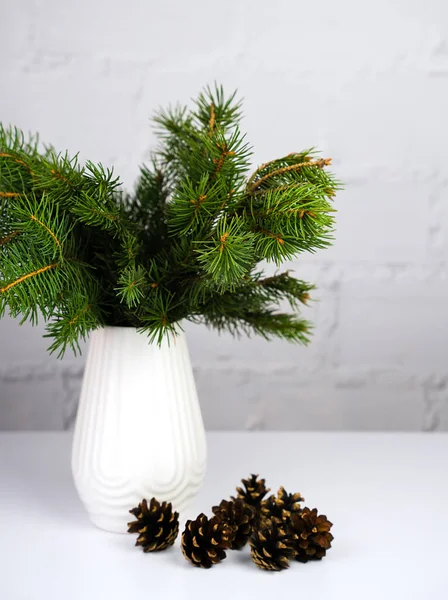 Christmas New Year Composition Fir Branches Vase Cones Table Selective — Stock Photo, Image