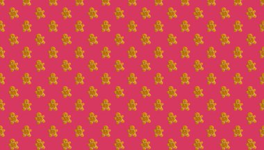 Viva Magenta 'nın arka planında izole edilmiş zencefilli kekten yapılmış kusursuz desen. Hediye paketi. Seçici odak.