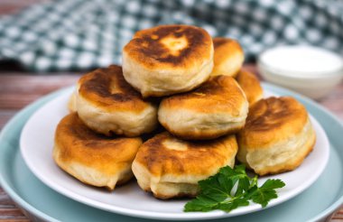 Homemade fried pies on the table. Close-up. Selective focus.