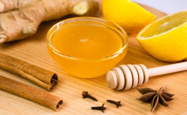 A honey, ginger, lemon and spices for a vitamin healthy drink. Close-up. Selective focus.