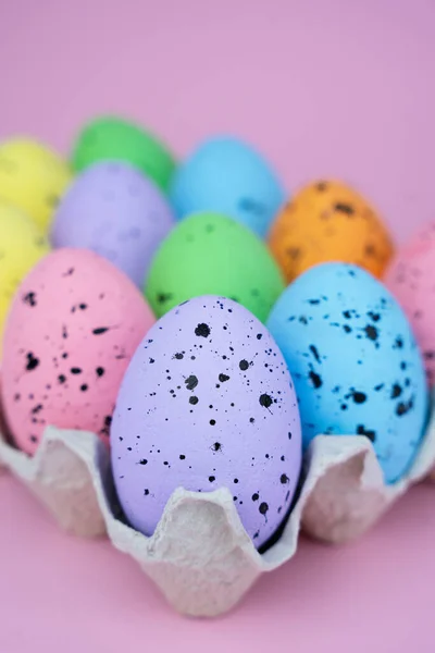 Close up of decorative Easter Eggs on the pink background. Easter decor. Close-up. Selective focus.