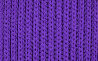 Desenli leylak rengi örülmüş yün kumaş dokusu. Üst Manzara. Yakın plan. Seçici odak.