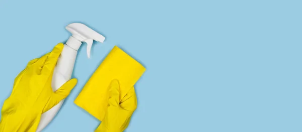 Women Hands Yellow Gloves Hold Rag Cleaning Sprayon Blue Background — Stock Photo, Image