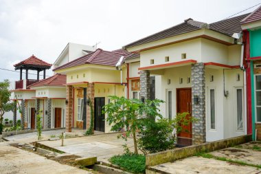 A collection of many houses neatly lined up with subsidies from the Indonesian government, which are small in size at low prices which are still under construction and under development. Kudus, Indonesia. 