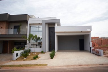 House facade with cloudy sky