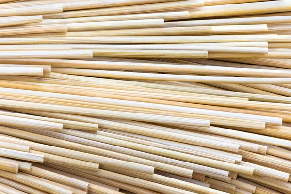 stock image Bamboo sticks placed overlapping in the same direction. Use for a background image that is a straight line pattern.