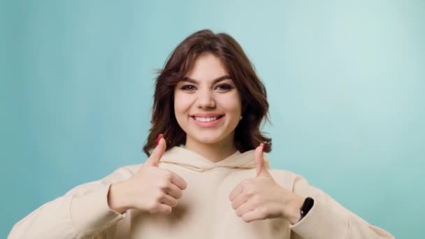 Young Female Adolescent All Smiles She Gives Thumb Studio Shot — Vídeos de Stock