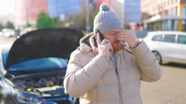 Stressed Angry Driver Looks His Broken Car Talks His Mobile — Wideo stockowe