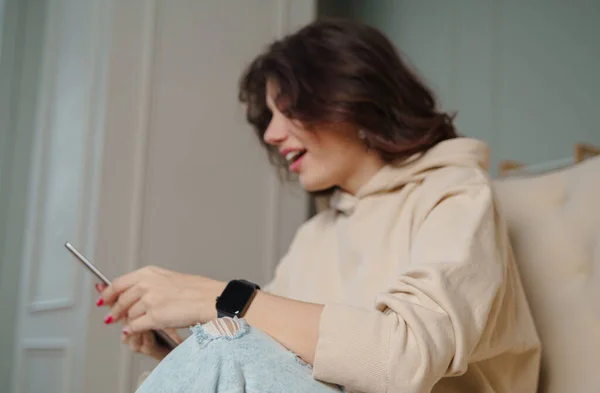 Portrait of woman happy smile looking digital tablet on blurred background.