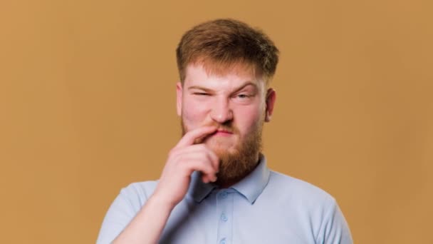 Hilarious Studio Shot Young Redhead Guy Looking Camera Finger Nose — Stok video