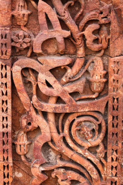 Bas relief carving in the sandstone of the minaret of Qutub Minar. Inscriptions carved into the Qutub Minar Tower. Detail of the Qutub Minar, the tallest minaret. Inscriptions in Qutb Minar basement