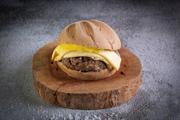 Craft beef burger with australian bread, cheese and honey mustard sauce.