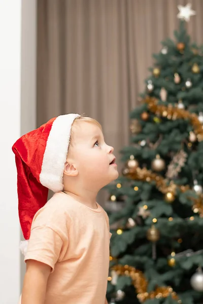 Christmas Concept Handsome Little Caucasian Boy Santa Claus Hat Stands Royalty Free Stock Photos