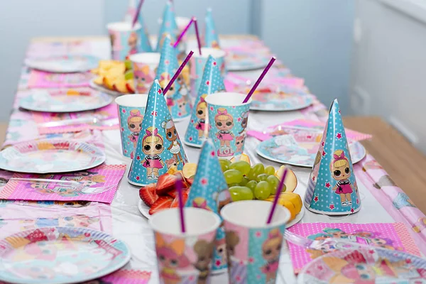 stock image Dnipro, Ukraine-April 11, 2023. Cute dolls L.O.L. Doll surprise toy, product of MGA Entertainment.inc Childrens party. table setting in the style of a LOL doll Soft focus. Close-up