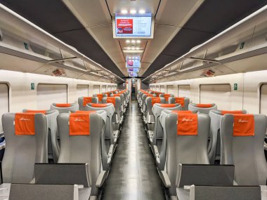 MILAN - CIRCA MAY 2023: High speed Frecciarossa Italian train, empty car clipart