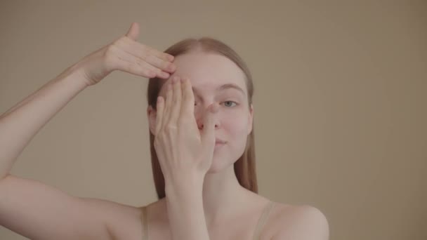 Head Shot Confident Attractive Young Lady Looks Camera Applies Moisturizing — Stock videók