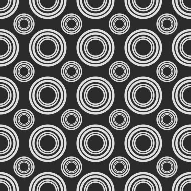 Karanlık bir yüzey üzerinde farklı boyut ve renklerde dairesiz desen arkaplanı