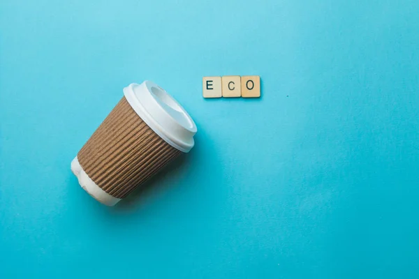Een Papieren Koffiebeker Deksel Met Een Bordje Met Daarop Eco — Stockfoto
