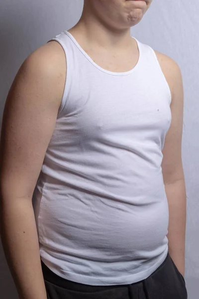 Overweight Shirtless Caucasian Teenage Boy Wearing Sleevless Top — Stock Photo, Image