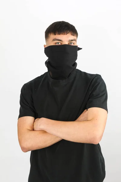 Adolescente Con Una Máscara Negra Sobre Fondo Blanco —  Fotos de Stock