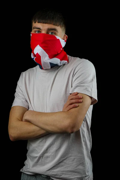 Adolescente Con Una Máscara Bandera Británica Sobre Fondo Negro —  Fotos de Stock